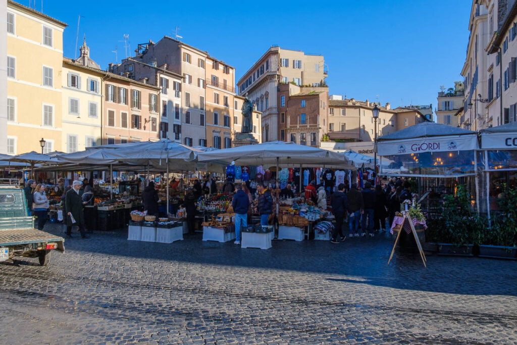 a group of people at a market